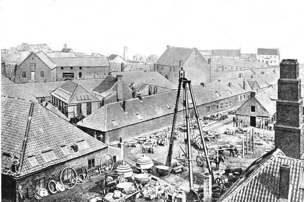 The Carron Iron Works 'triangle' with its bell on top.