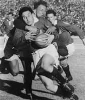 Who is this former Welsh stand-off and Question of Sport captain, pictured in 1955? (Photo: Getty Images)