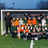 Youngsters from St Patrick's Primary School are loving the chance to play on the Dunipace FC pitch. Pic: Mark Ferguson