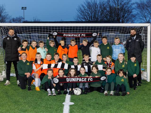 Youngsters from St Patrick's Primary School are loving the chance to play on the Dunipace FC pitch. Pic: Mark Ferguson