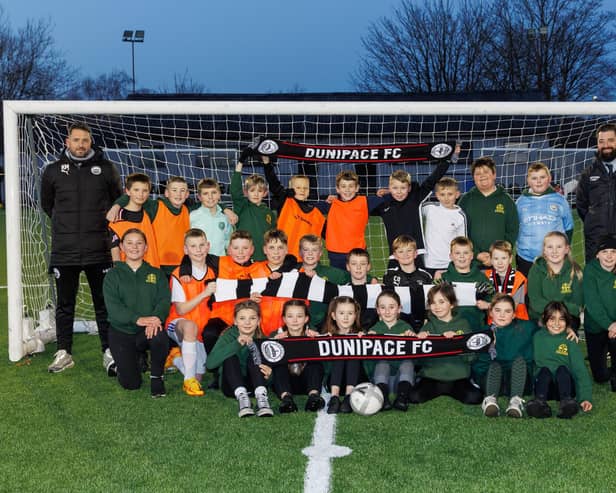 Youngsters from St Patrick's Primary School are loving the chance to play on the Dunipace FC pitch. Pic: Mark Ferguson