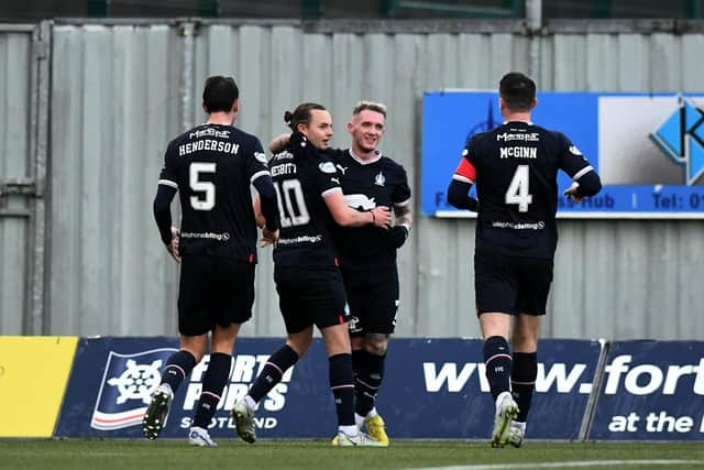 Callumn Morrison is mobbed by his Falkirk teammates after scoring the opener against Clyde (Pics by Michael Gillen)