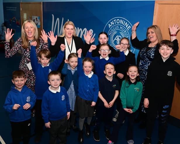 Pupils and staff at Antonine Primary School and Nursery celebrate a good report from inspectors.