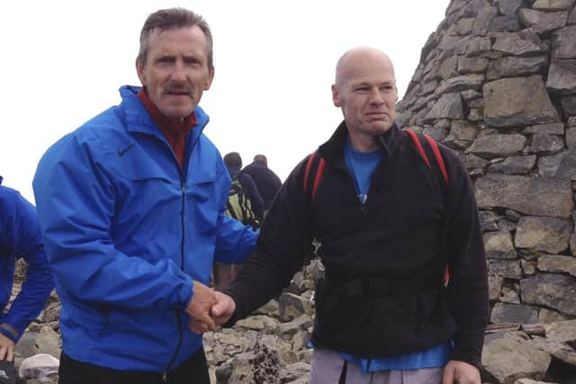 Former East Stirlingshire player Alan Miller and Shire chairman Tony Ford after completing the Parkinson's Ben Nevis Challenge in 2013. Pic: Contributed