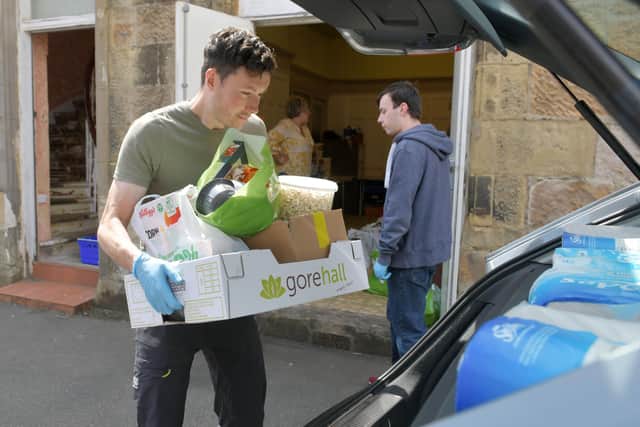 Keeping Larbert and Stenhousemuir Beautiful Community Pantry and Stenhousemuir FC Community Help Initiative team members have distributed food parcels to those in need throughout the pandemic. Picture: Michael Gillen.