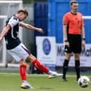 Finn Yates slams home the penalty that secured Falkirk’s win over Alloa Athletic on spot kicks following a 0-0 draw