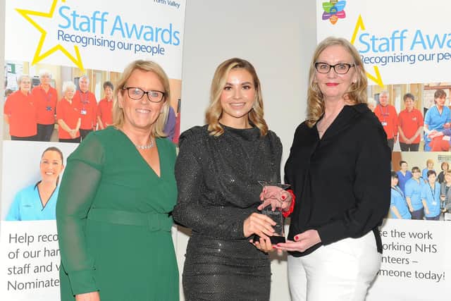 Midwife Chloe Jackson receives the Outstanding Care Award. Pic: Whyler Photos