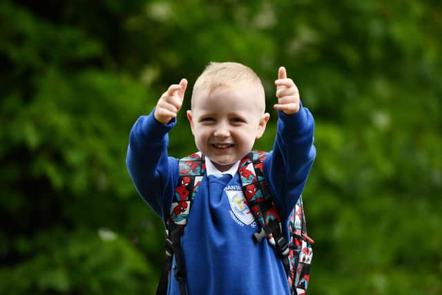 Thumbs up from Harry Frank, five, on starting school