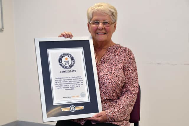Anne Bell with her Guinness World Record certificate