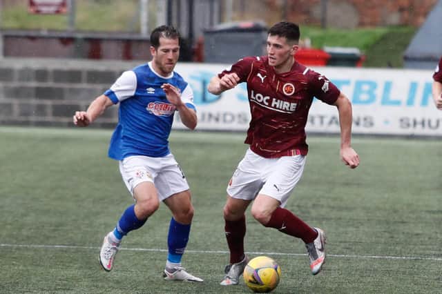 Adam Corbett on the ball (Picture: Scott Louden)