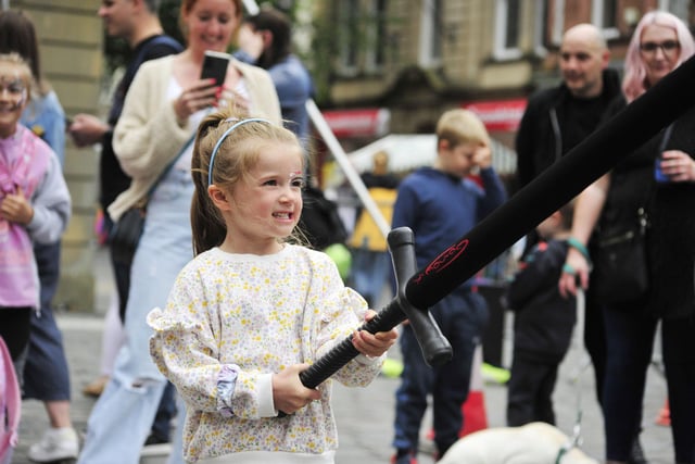 Even the youngest of those attending Saturday's event got to try their hand at wielding replicas of weapons used centuries earlier