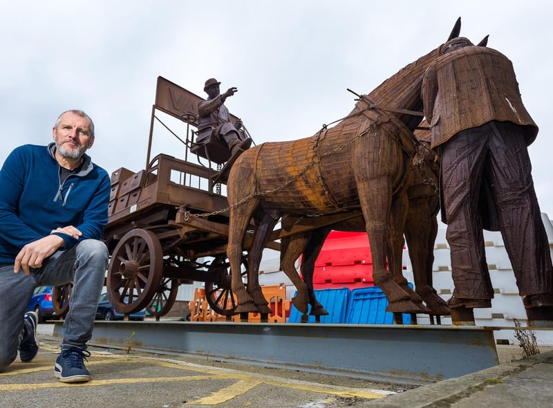 The highly-detailed sculpture includes spokes on the wheels.