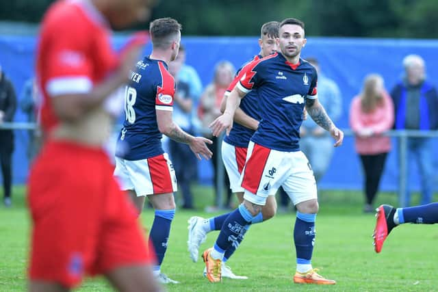 Jordan Allan celebrates drawing Falkirk level against Civil Service Strollers (Pictures by Michael Gillen)