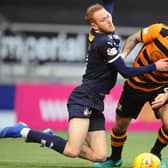 Falkirk's Steven Hetherington fouling Alloa's Zak Rudden the last time the two sides met back in April 2019 (Pic: Michael Gillen)