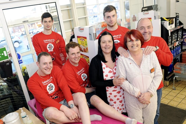 Store managers Mark Lord and Fraser Caldwell, from Denny's Sainsbury's store, had their legs waxed for the charity in 2013.