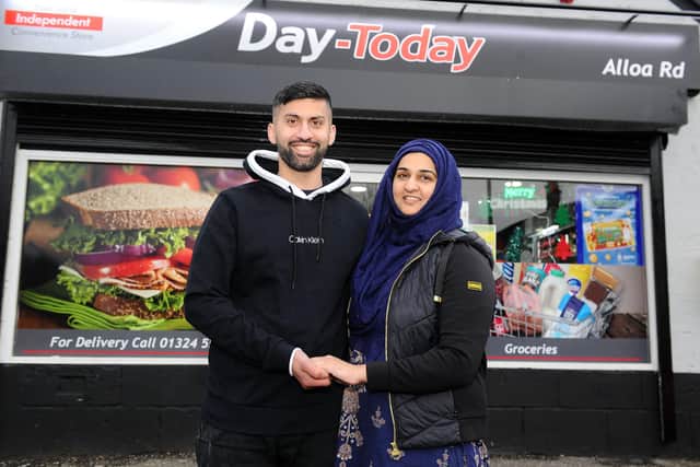 Jawad and Asiyah Javed, owners of Day-Today in Stenhousemuir, won the Spirit of the Community Award at the Asian Trader Awards. Picture: Michael Gillen.