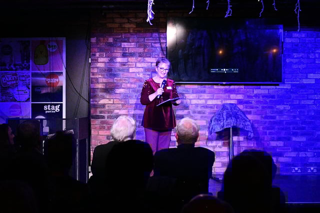Louise Murray welcomes guests to the launch of her husband's book.