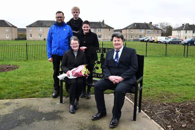 The bench in Bainsford in memory of Jim Irvine, pictured: Mary Irvine, Jim's wife, with son Colin Irvine, grandson Cameron Irvine, daughter Fiona Myles and Provost Robert Bissett. Pic: Michael Gillen
