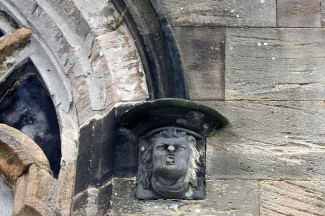 One of the carved heads on the Zetland Tomb in Trinity Church.  (pic: submitted)