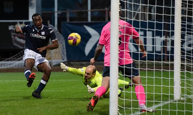 DUNDEE, SCOTLAND - NOVEMBER 12: Zach Robinson scores to make it 2-0 uring a cinch Championship match between Dundee and Raith Rovers at Dens Park, on November 12, 2022, in Dundee, Scotland. (Photo by Sammy Turner / SNS Group)