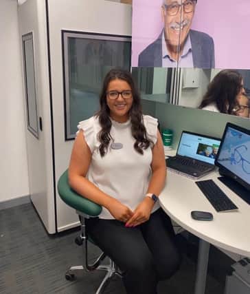 Claudia McCue, 22, is the company's youngest hearing director. She works at the store on Falkirk High Street.