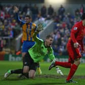 A late goal by Luis Suarez (pictured) denied John McGlynn famous win at Anfield (Pic by Clive Mason/Getty Images)