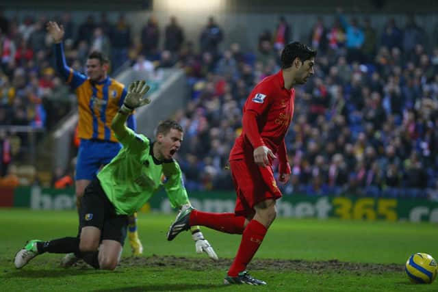 A late goal by Luis Suarez (pictured) denied John McGlynn famous win at Anfield (Pic by Clive Mason/Getty Images)