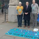 Falkirk MP John McNally join constituents Cath and Richard Dyer during the climate justice protest in Westminster
(Picture: Submitted)