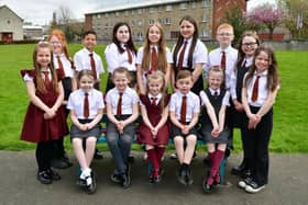 Grangemouth Children's Day Queen elect Erica Harvey - centre back row - with her royal retinue
