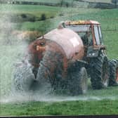 Field sprayed with sewage sludge