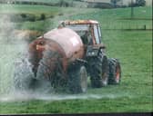 Field sprayed with sewage sludge