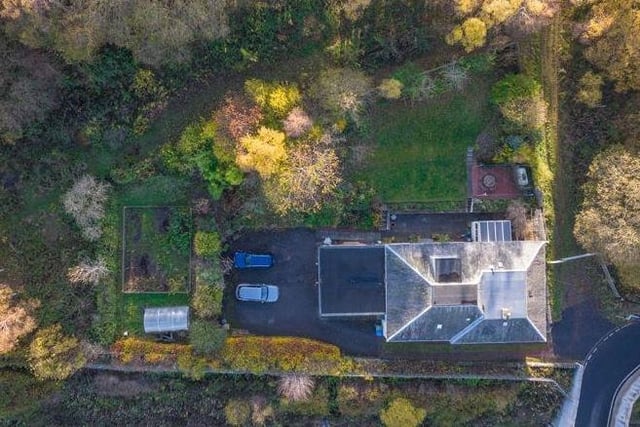 Aerial shot gives you a fantastic view of both the home and gardens.
