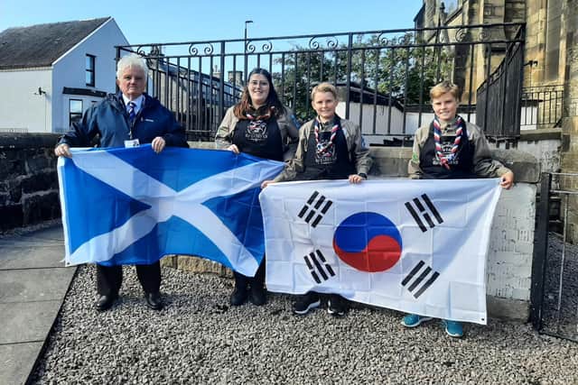 Councillor Billy Buchanan with Emma Harvey from Bonnybridge, Douglas and  Fraser MacPherson from Brightons, who will be representing Falkirk next year at the World Scout Jamboree in Korea.