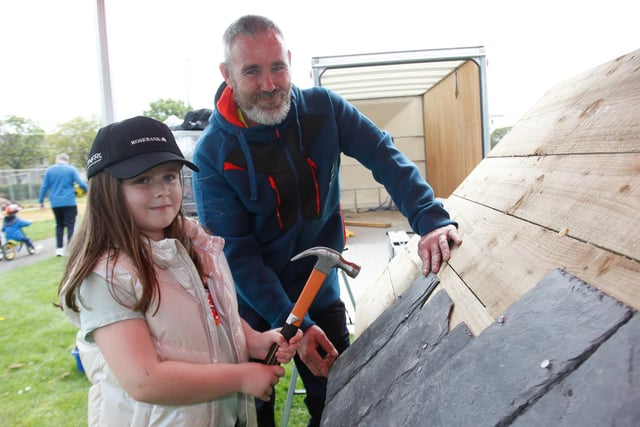 Macey, 7, from Falkirk, with Brian Welsh of Rosebank Roofing.