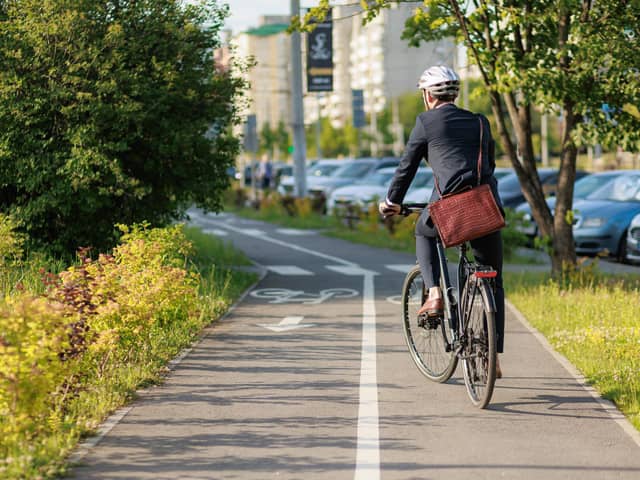 Cycling helps keep us healthy and helps towards the impact on climate change. Photo: Adobe