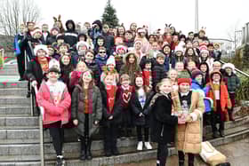 Dunipace Primary School pupils sang Christmas songs to bring some community Christmas cheer.