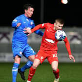 Max Kucheriavyi looks to control the ball under pressure from Kelty Hearts' Joe Cardle (Pictures by Michael Gillen)