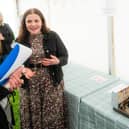 Chloe Edwards and her cake depicting the Steeple and surrounding buildings