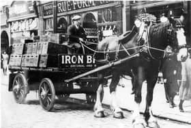 The mighty Clydesdale horse Carnera hard at work in Falkirk town centre back in the day