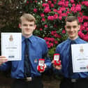 Two of the last Boys' Brigade members to become Queen's men - 2nd Larbert Company members Euan George and Andrew McKinlay with their Queen's Badges