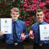 Two of the last Boys' Brigade members to become Queen's men - 2nd Larbert Company members Euan George and Andrew McKinlay with their Queen's Badges
