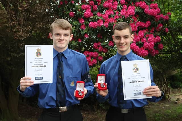 Two of the last Boys' Brigade members to become Queen's men - 2nd Larbert Company members Euan George and Andrew McKinlay with their Queen's Badges