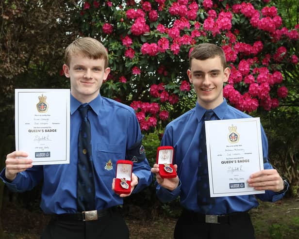 Two of the last Boys' Brigade members to become Queen's men - 2nd Larbert Company members Euan George and Andrew McKinlay with their Queen's Badges