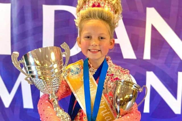 Shannon with her trophies from the championship.