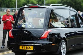 The player made one final visit to Falkirk FC where ALex Totten added a wreath. Picture: Michael Gillen.