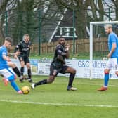 Nat Wedderburn and Nicky Jamieson both put their bodies on the line to block an effort at goal (Pictures: William McCandlish)
