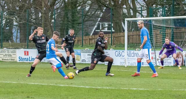 Nat Wedderburn and Nicky Jamieson both put their bodies on the line to block an effort at goal (Pictures: William McCandlish)