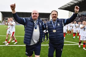 Falkirk management team John McGlynn and Paul Smith enjoy the moment after leading the Bairns' to a historic invincible League One campaign last season (Photo: Michael Gillen)