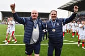 Falkirk management team John McGlynn and Paul Smith enjoy the moment after leading the Bairns' to a historic invincible League One campaign last season (Photo: Michael Gillen)