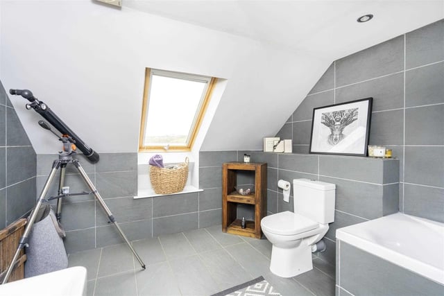 The bedroom at the top of the house has its own ensuite bathroom.